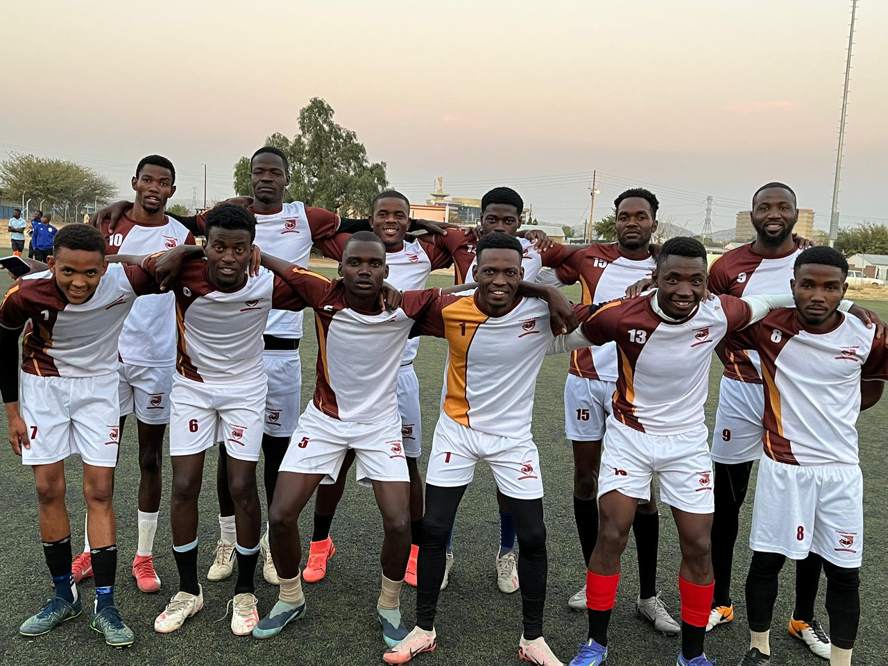 Triumphant College Soccer Team